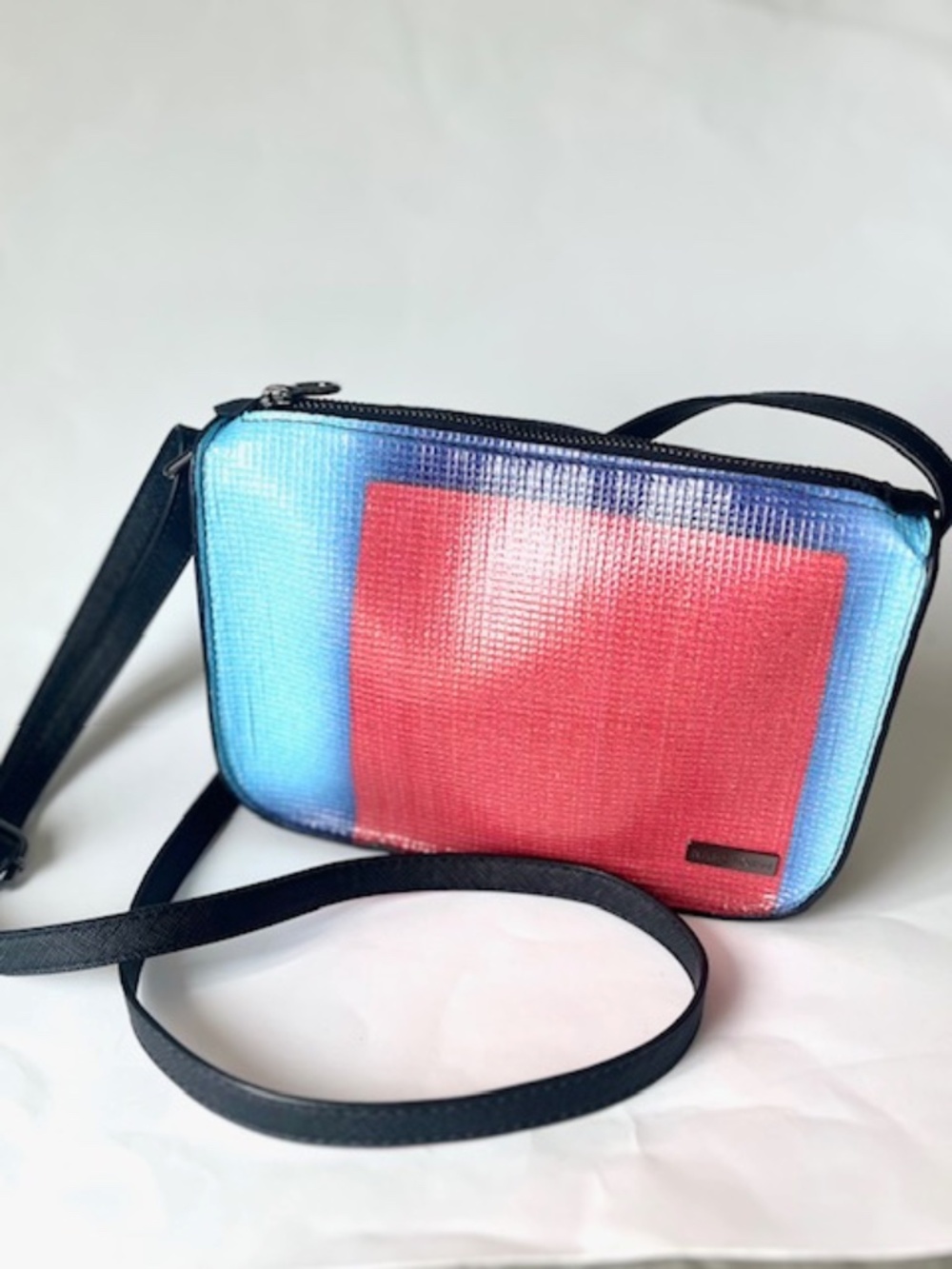 Rare Form Rae Crossbody Bag Made of billboard sign